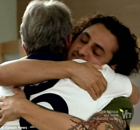 Emotional hug: Eric Roberts and stepson Keaton Simons reunited on Celebrity Rehab after spending 16  years not speaking