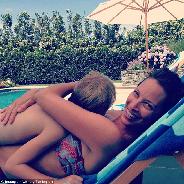 Ms Turlington-Burns pictured with her son Finn in 2013