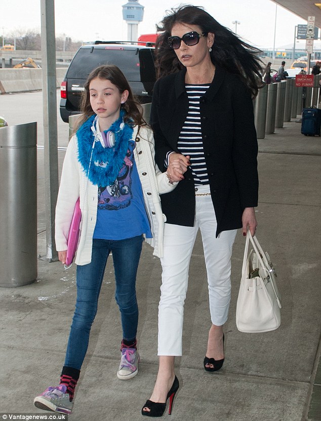 On Saturday: Just two days earlier his wife Zeta-Jones and their daughter were seen leaving JFK airport, as Douglas (not pictured) trailed behind