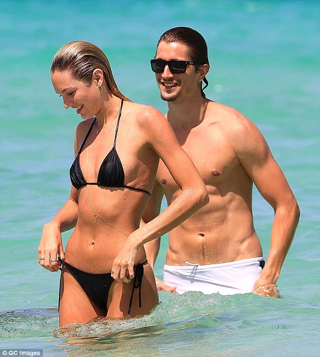 Beach babes: Candice and Hermann, who is also a model, met in Paris when she was just 17