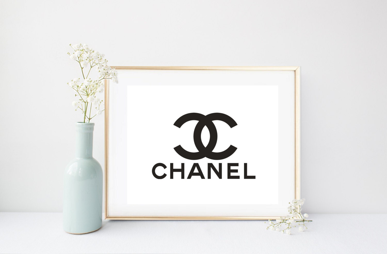 Шанель лого. Коко Шанель эмблема. Фирменный знак Коко Шанель. Coco Chanel logo. Монограмма Коко Шанель.